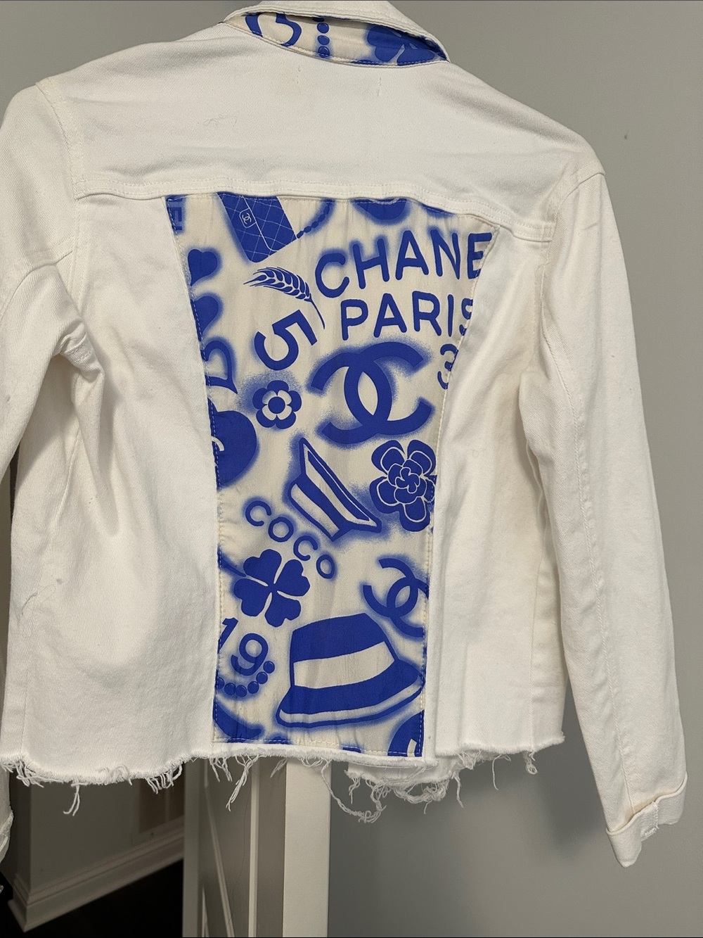 White denim jacket upgraded with Chanel scarf on the back